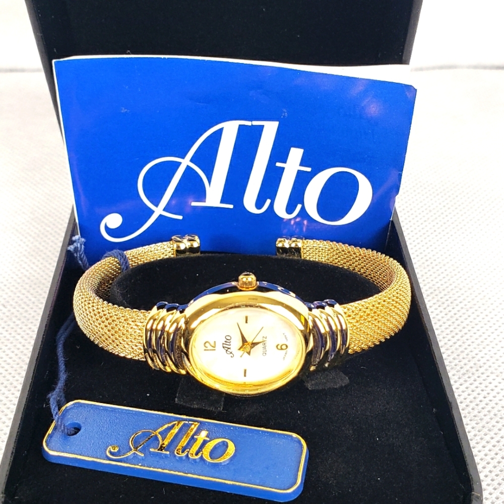 Gently used with tags Alto Gold Bracelet Watch